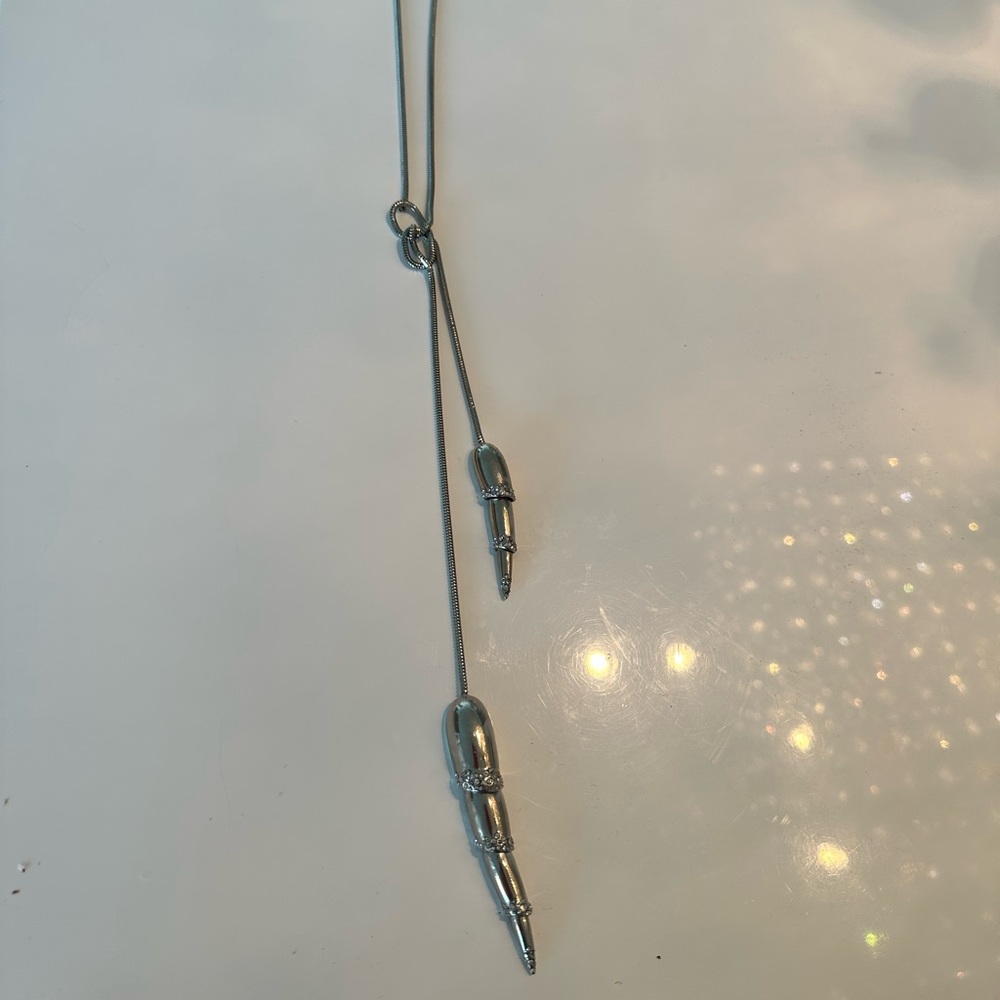 Alexis Bittar long Silver Horns necklace with rhinestones